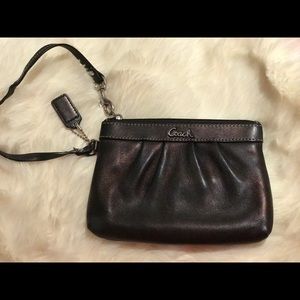 Black leather coach wristlet.